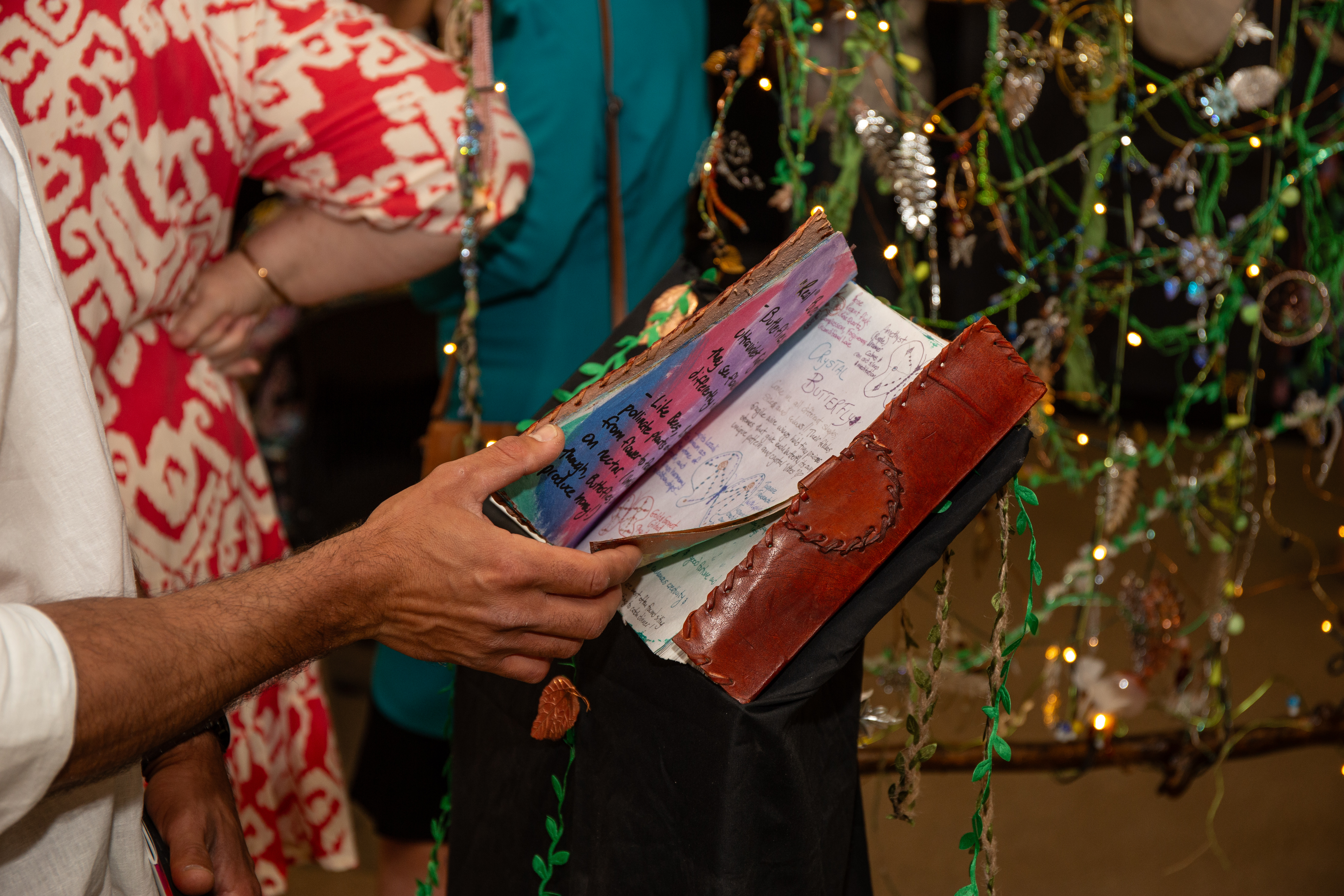 Brigalow Arts Festival 2024 - Opening Event Attendees interacting with 'Unapologetic' by Fiona Hayward